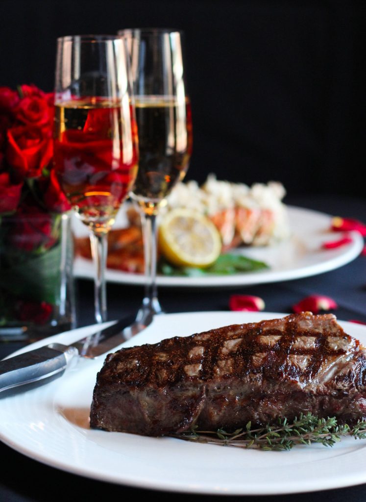 Steak With two glasses of wines on Valentine's Day